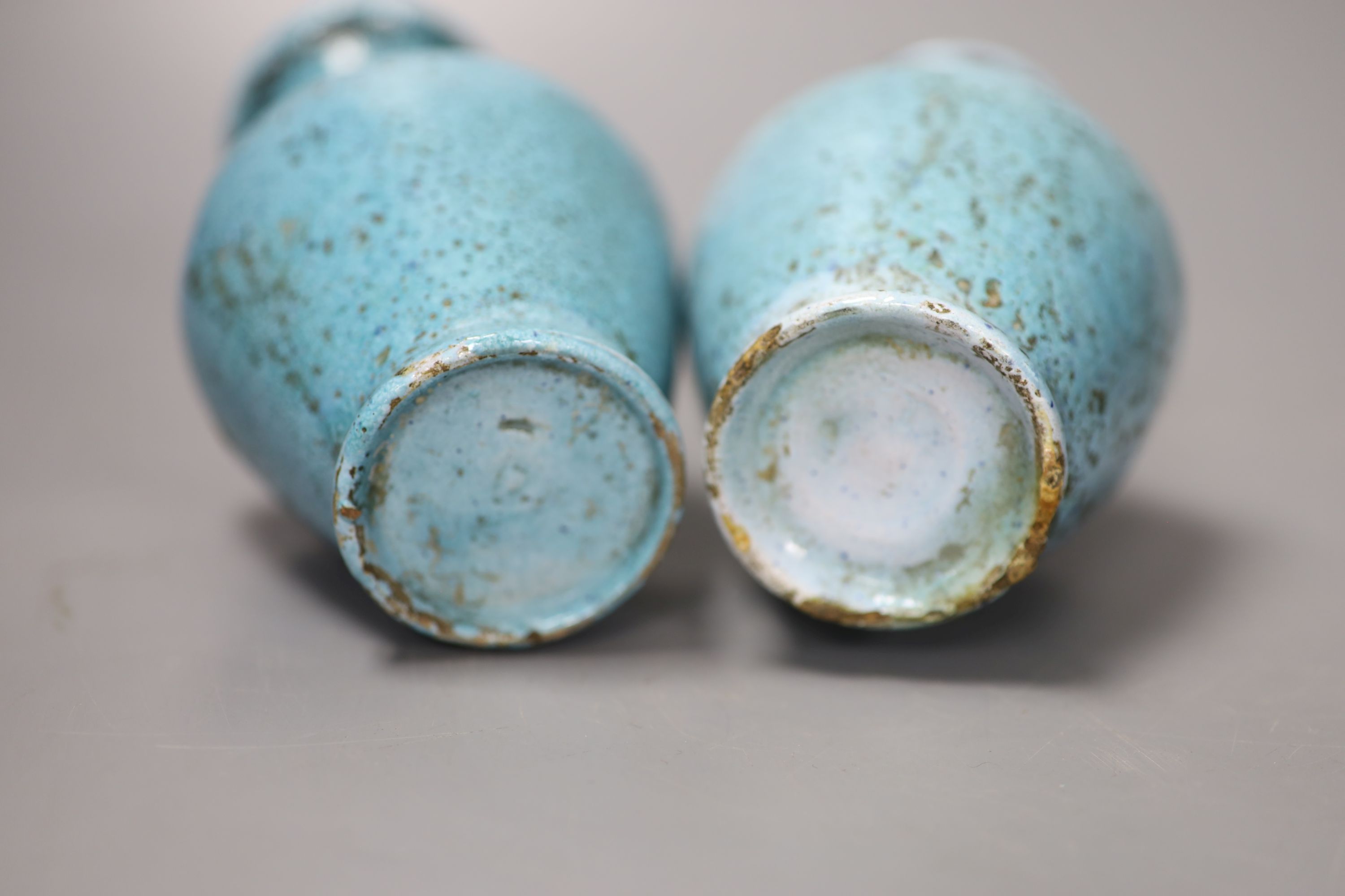 A pair of pale blue Eastern pottery vases, 16.5cm high